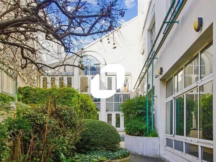 Dans un bel immeuble de bureau, Immprove vous pro