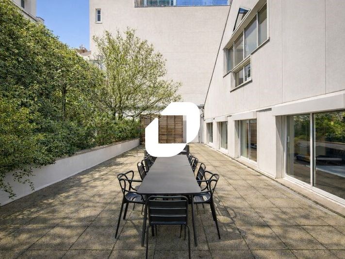 Dans un bel immeuble de bureau, Immprove vous pro