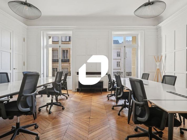 Dans un bel immeuble Haussmannien à proximité imm