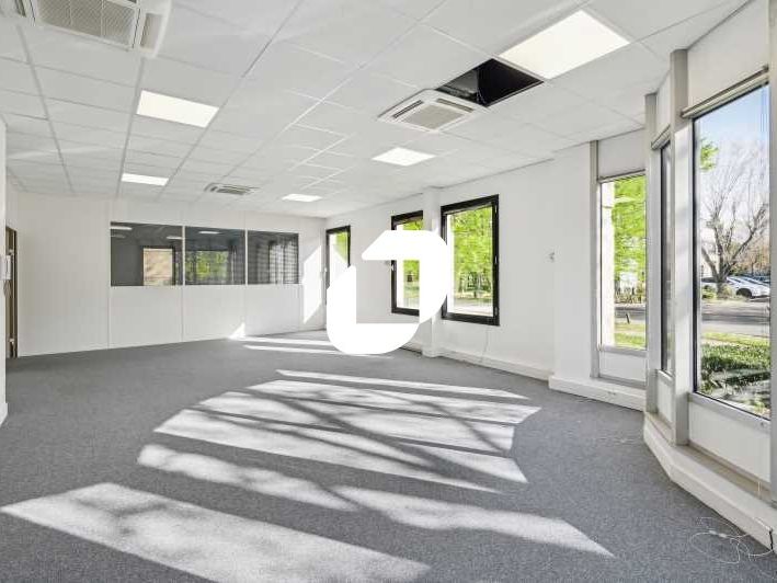 Dans un immeuble de standing au sein du Parc des 