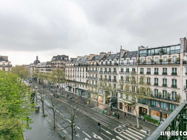 Dans un bel immeuble haussmannien, nous vous prop
