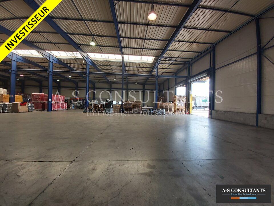 VIRIVILLE – MARCILLOLES (38980) à vendre local de 3 528 m² dont 128 m² de bureaux et parking de 9 places situé porche des grands axes