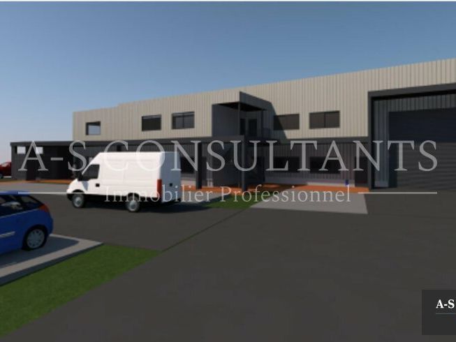 A LOUER - SAINT-ALBAN-LEYSSE (73230) -  entrepôt avec mezzanine (commerce possible) d'une surface de 300 m² au sol + 100 m² de mezzanine environ - programme neuf livré brut, fluides en attente - grand terrain avec parkings privatifs.