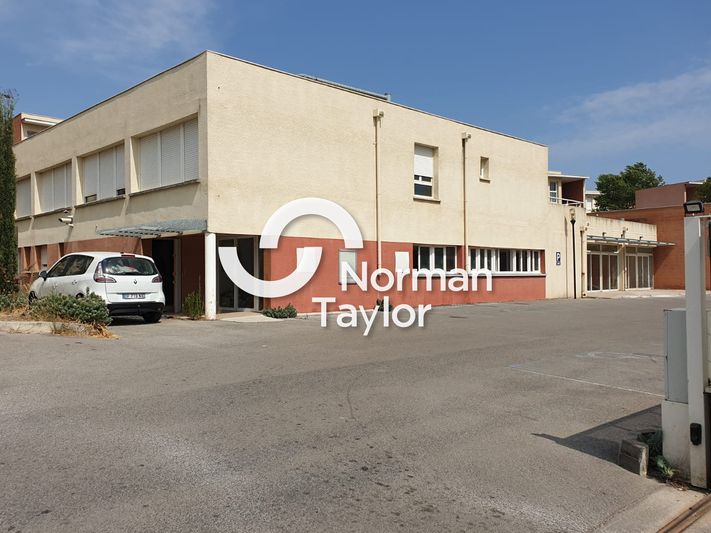 Location local d''activites 297.94 m² divisibles à partir de 107.24 m²