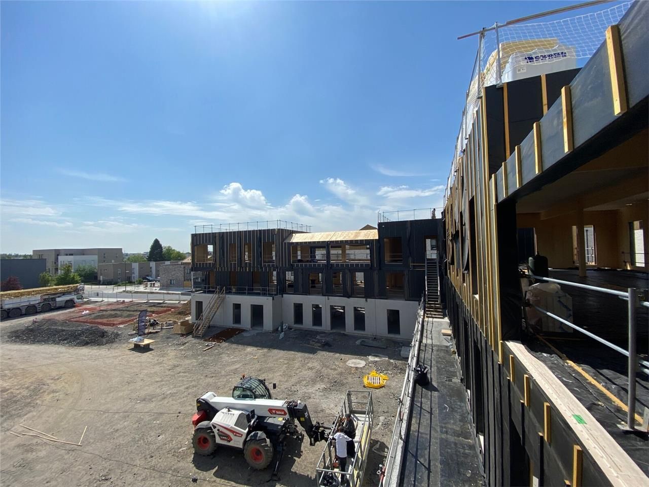 Dans le prolongement du parc EcoSpace, deux immeu
