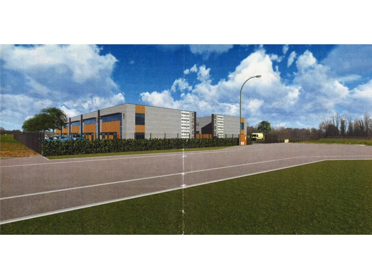 Dans une zone d'activités au nord de l'agglomérat