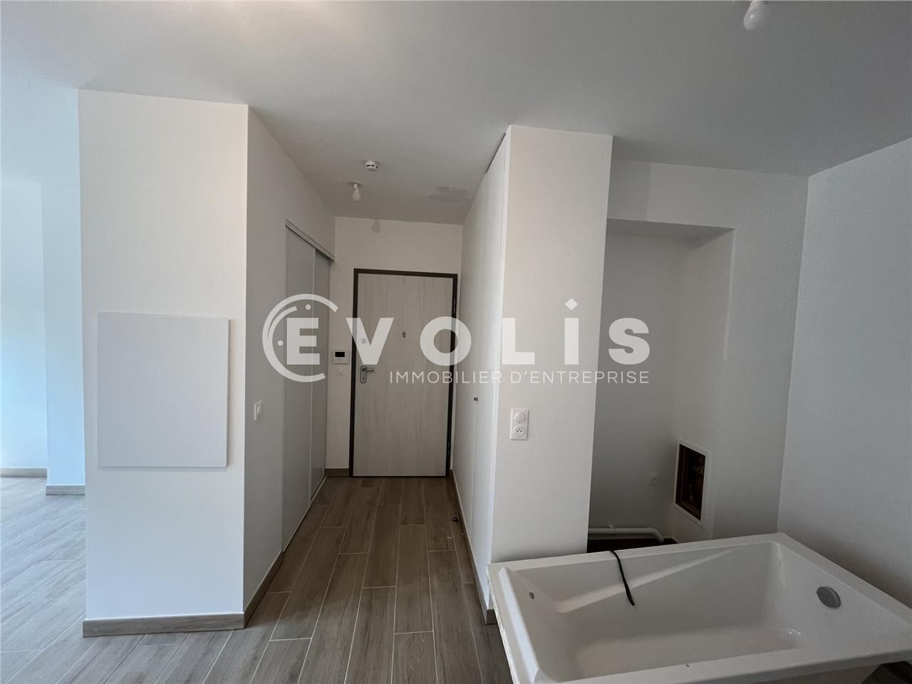 Nichée au coeur d'un quartier vibrant et dynamiqu