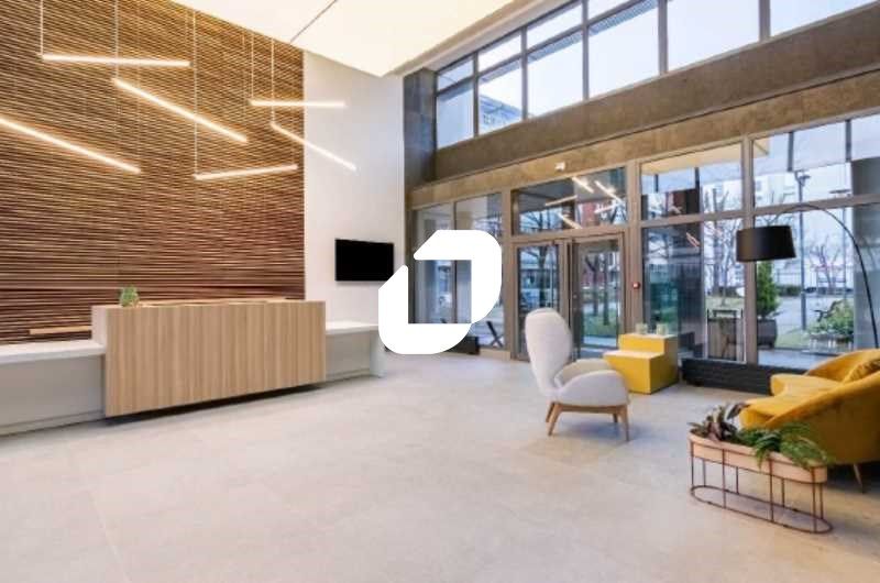 Au sein d'un immeuble de bureaux de bon standing,