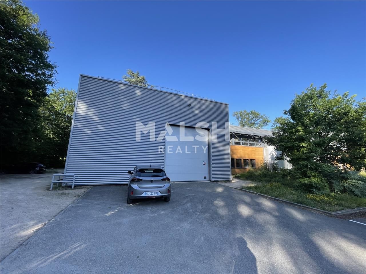 Au sein d'un parc tertiaire boisé et qualitatif à