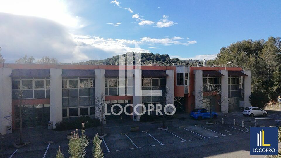 A LOUER - BATIMENT INDEPENDANT MIXTE - 2 352 M2 - 89 PLACES DE PARKINGS