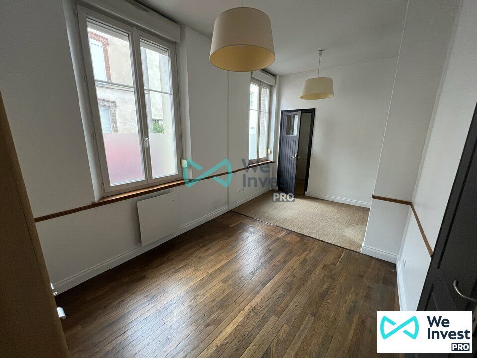 À louer – Local commercial / bureaux en angle de rue (secteur Saint-Marceau / Pommery)