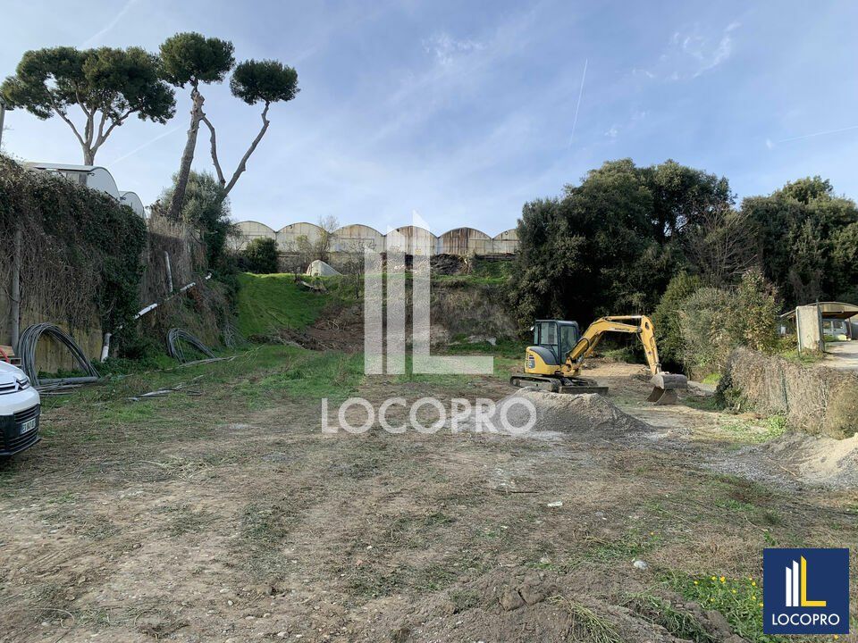 Location terrain 1700 m² non divisibles