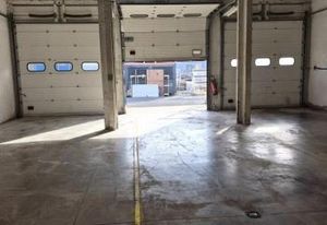 Location local activité Thise - Porte sectionnelle plain-pied