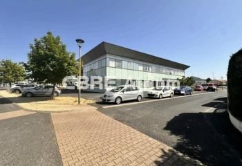 Location bureaux Issoire - Entrée zone commerciale, stationnements