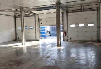 Location local activité Thise - Porte sectionnelle plain-pied